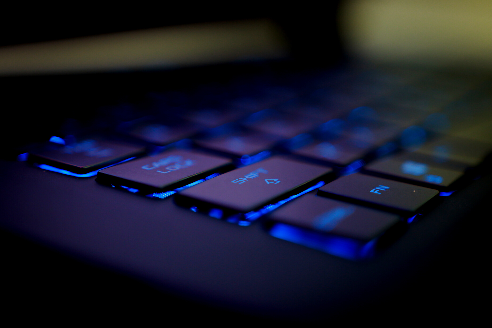 Close up of Blue Lit Laptop Keyboard